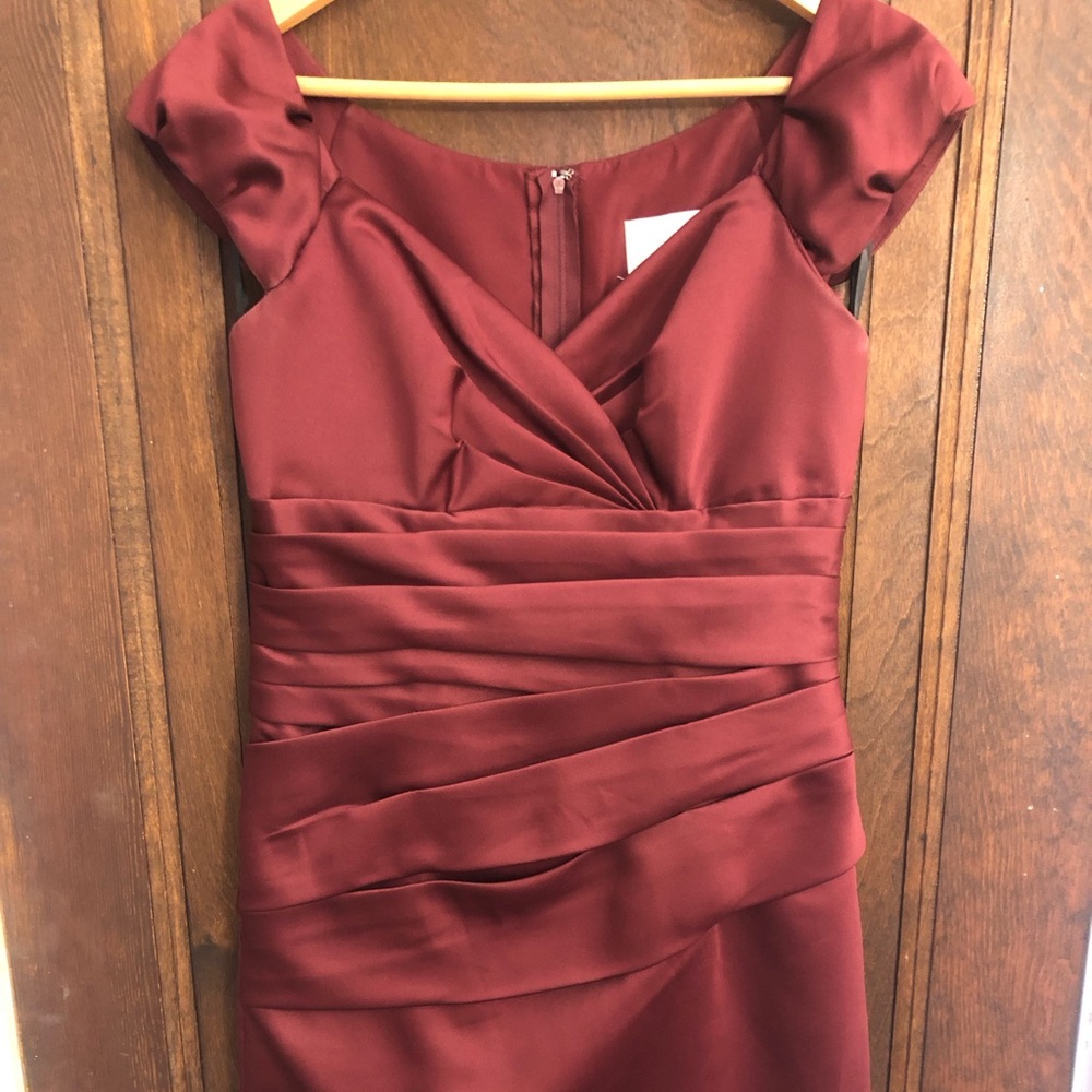 Alfred Angelo formal knee length dress. Cap sleeve. Burgundy. Size 8